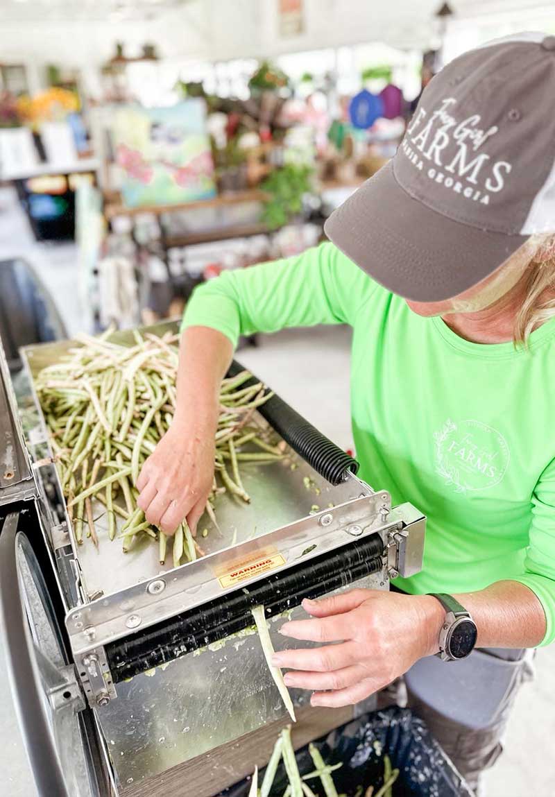 Processing beans at the Garden Center